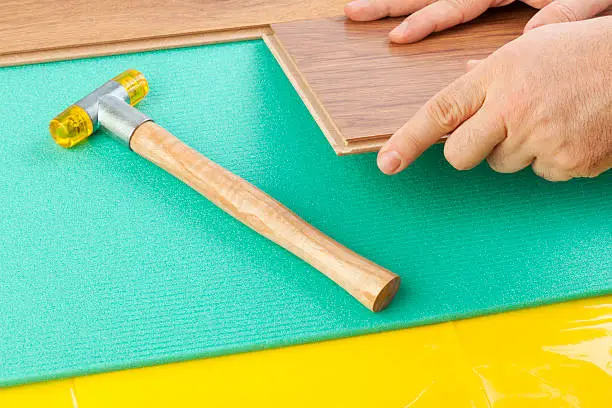 Can I Install Underlayment Under Laminate With Attached Padding