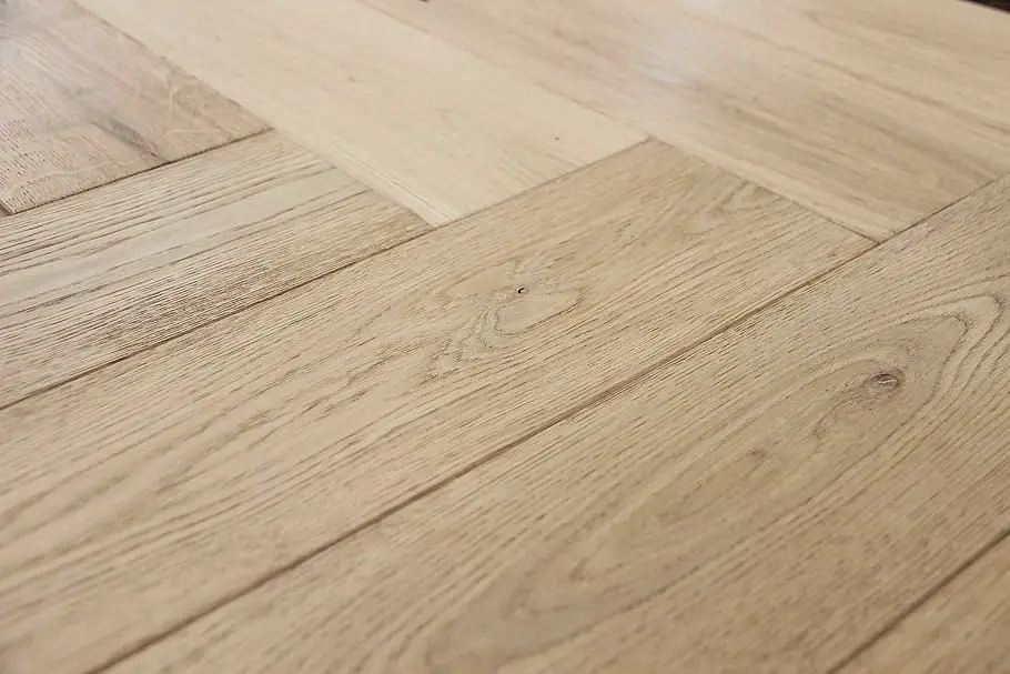 Which Type Of Wood Flooring Is Composed Of All Wood And Can Be Sanded And Refinished